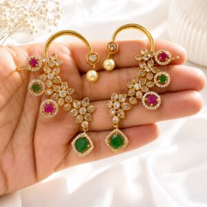 Indirani statement earcuffs pair in gold-plated brass embellished with sparkling AD stones