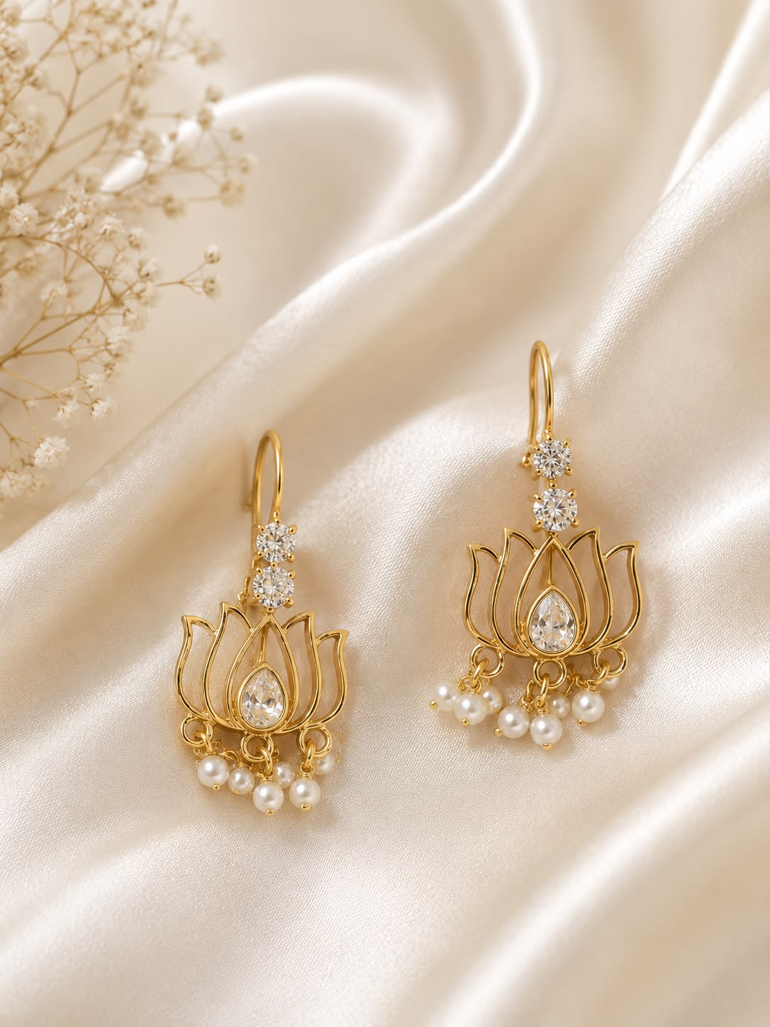 Leela Sui Dhaaga drop earrings in gold-plated brass with lotus motif and round brilliant AD stones